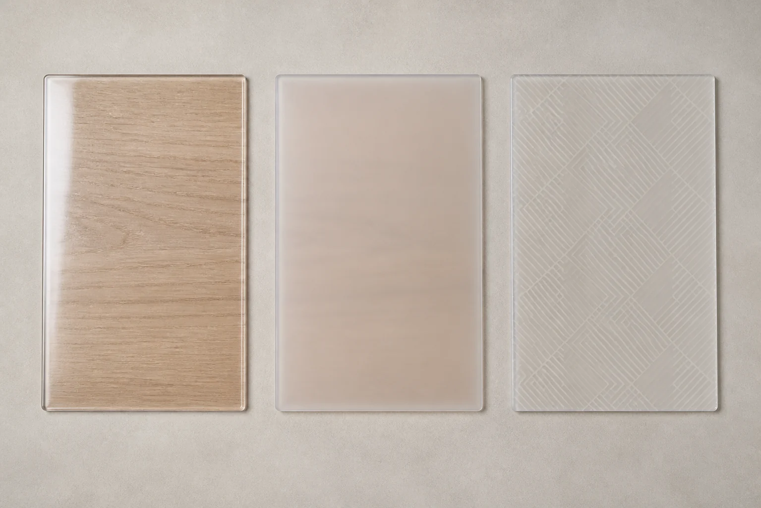 Three complete clear frosted and patterned PVC table-cover sheets shown without labels