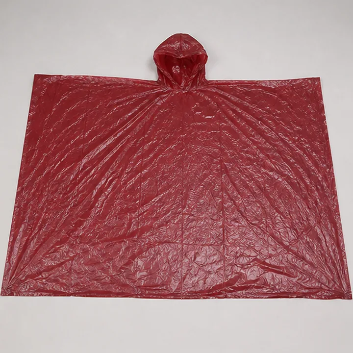 Plain burgundy PE poncho route shown flat for bulk comparison