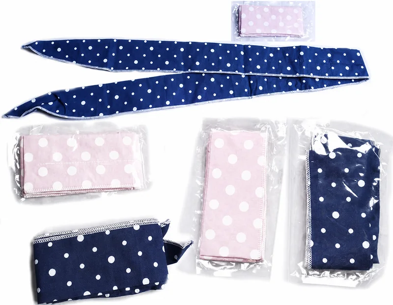 Complete navy polka-dot cooling wraps shown long and folded with individual clear bag packing